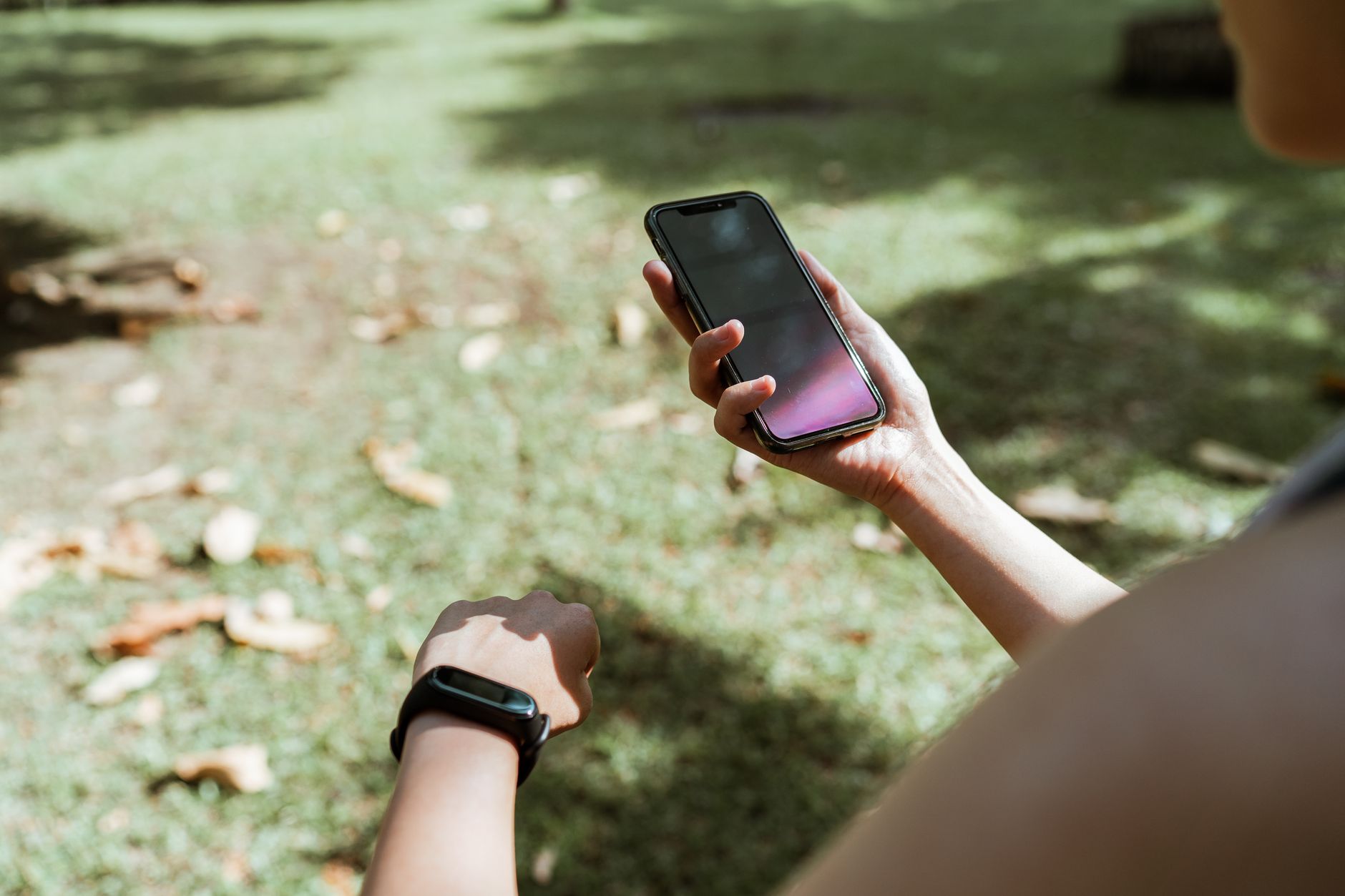 Phone and watch outdoors